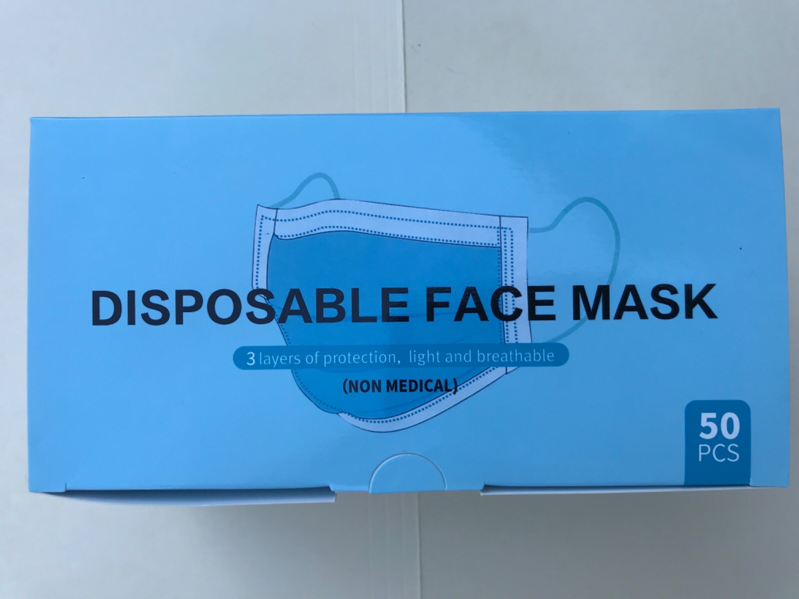 4 boxes) 50 Disposable Face Masks 3-Layers of Protection Earloop