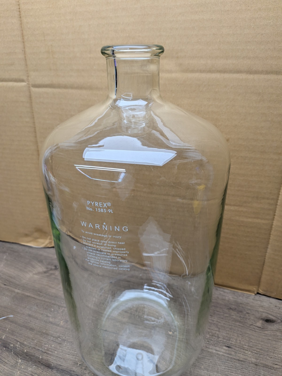 NOS PYREX 1585-9L is a heavy-wall, 9-liter borosilicate glass serum bottle