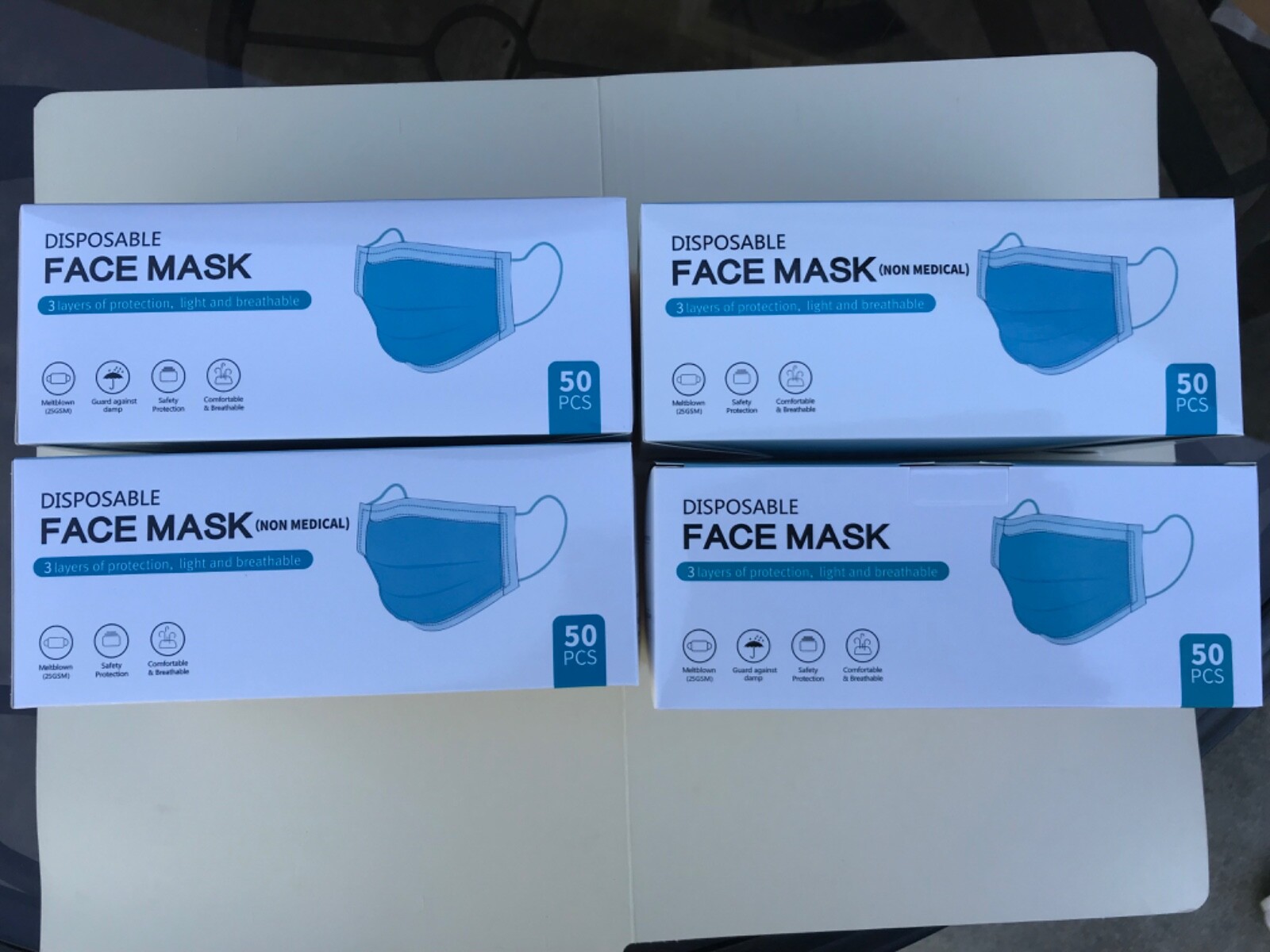 4 boxes) 50 Disposable Face Masks 3-Layers of Protection Earloop