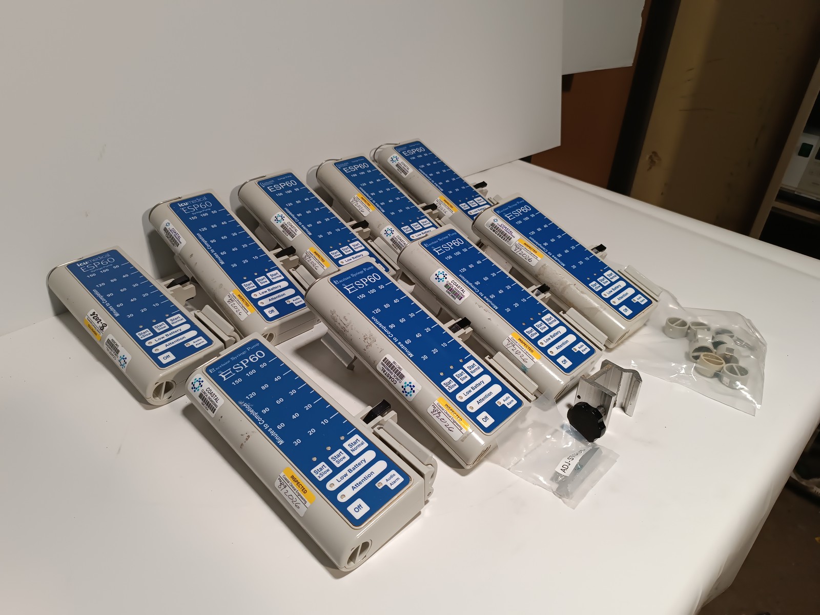 Lot of 9 Excelsior Medical ESP60 syringe pumps as shown w/ clamp parts
