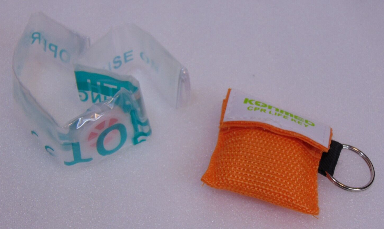 Pocket CPR Mask Face Shield Keychain 1 Orange Compression CPR Safety Device