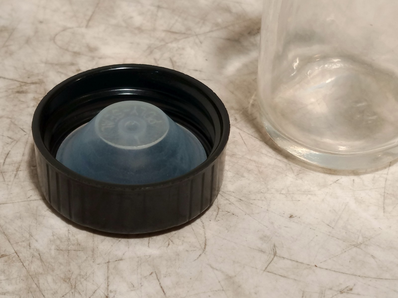 Unbranded Lot of 10 Clear Glass Sample Bottles w Black Caps as shown