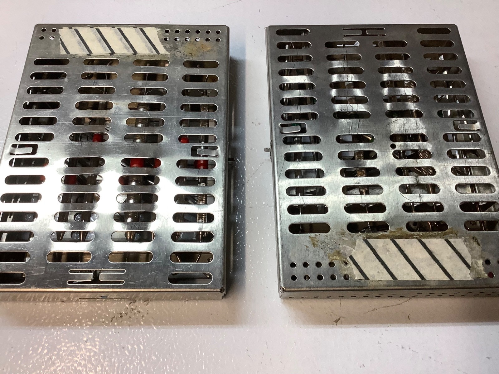 2 – DENTAL STERILIZATION CASSETTES WITH INSTRUMENTS USED