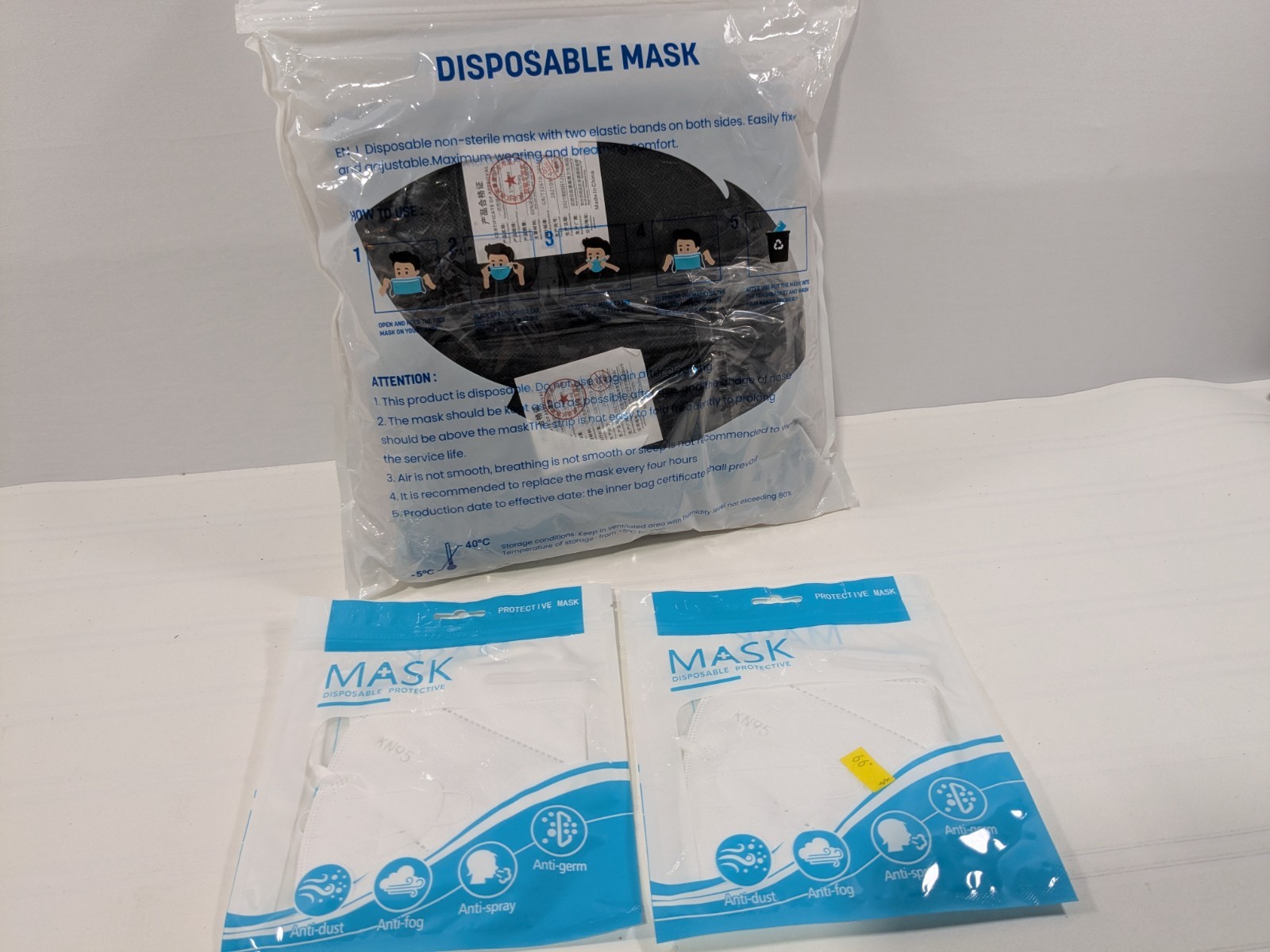 Pack of 100 Disposable Masks Black 3 Protective Layers with 2x KN95 Face Masks